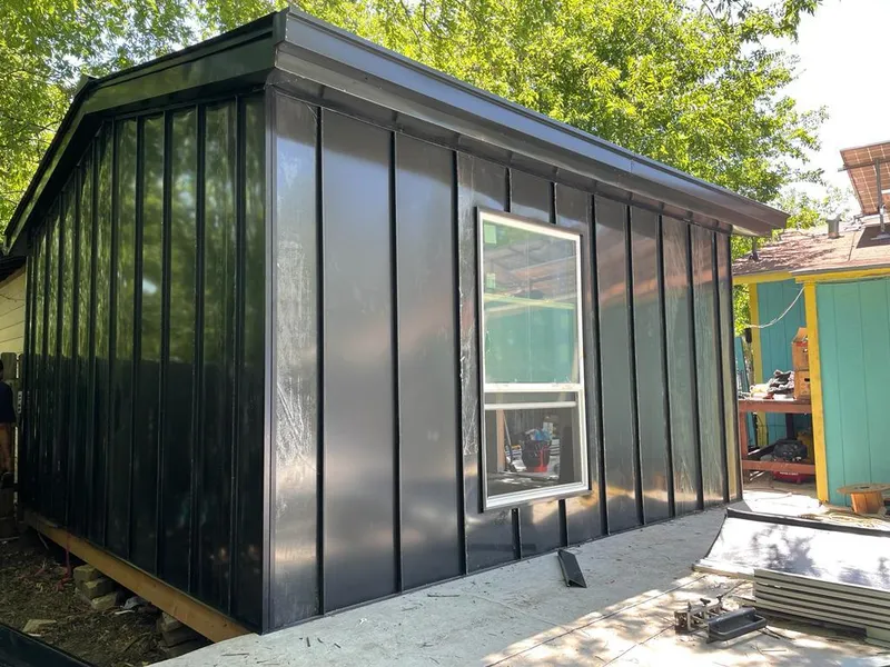 Black standing seam metal wall panels for Metal Roof Installation in La Palma