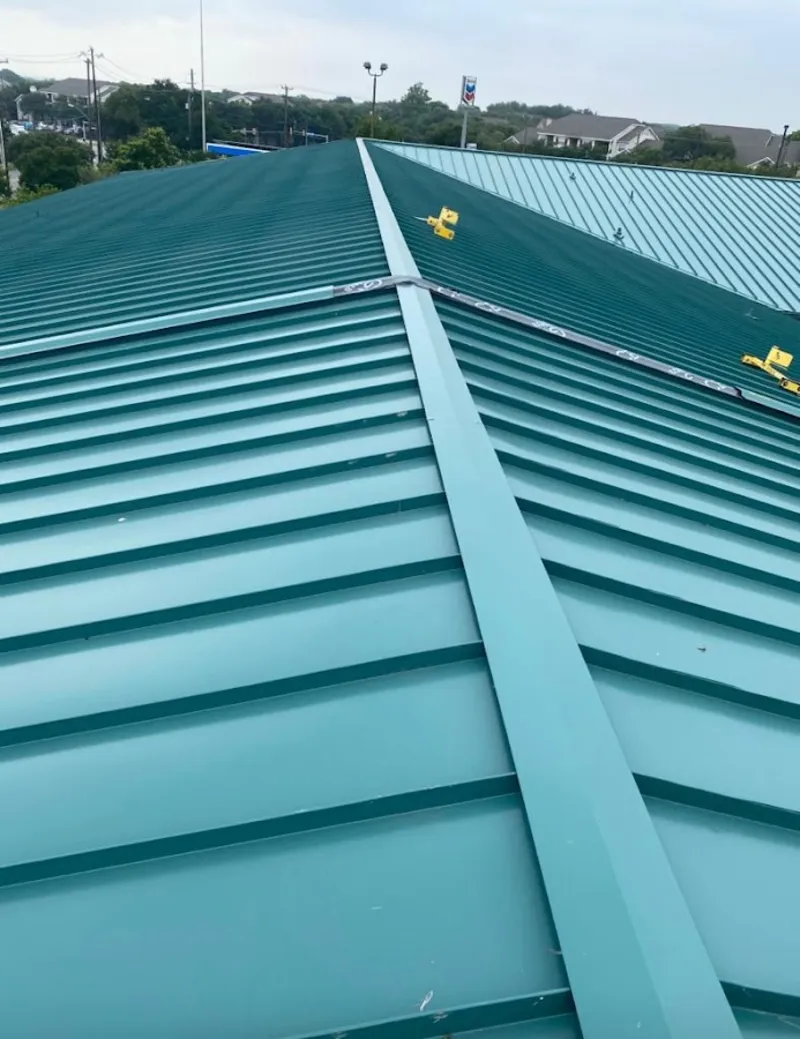 Green commercial metal roof ridge and valley for Metal Roof Repair in La Palma